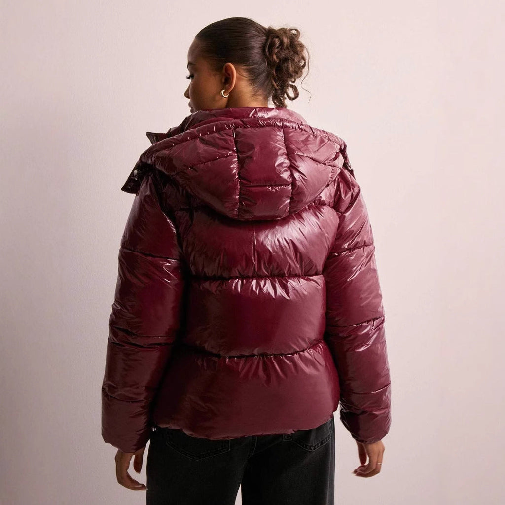 Women's shiny quilted hooded puffer jacket with leopard cuffs