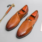 Textured loafers with penny-style straps in brown and black