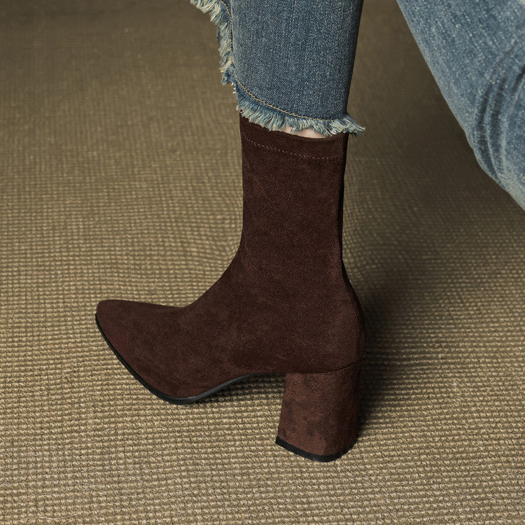 Women's ankle boots with pointed toes, side zips and high block heels
