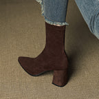 Women's ankle boots with pointed toes, side zips and high block heels