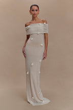 Women's off-shoulder knit maxi dress with decorative rosettes
