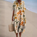 Women's floral V-neck shift dress with short sleeves and knee-length hem