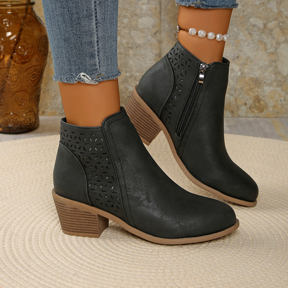 Women's ankle boots with laser cut panels and block heel