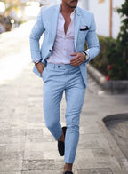 Men's textured two-piece suit with notch-lapel blazer and tapered trousers