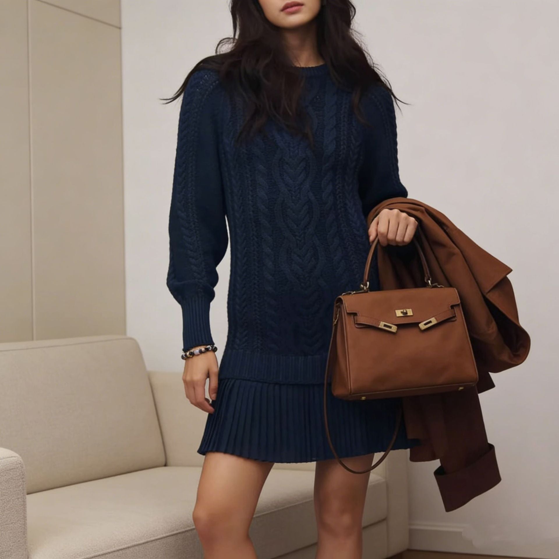 Women's long-sleeve cable knit sweater with a crew neckline and ribbed trims