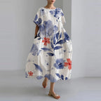 Women's loose floral midi dress with short sleeves and flared skirt