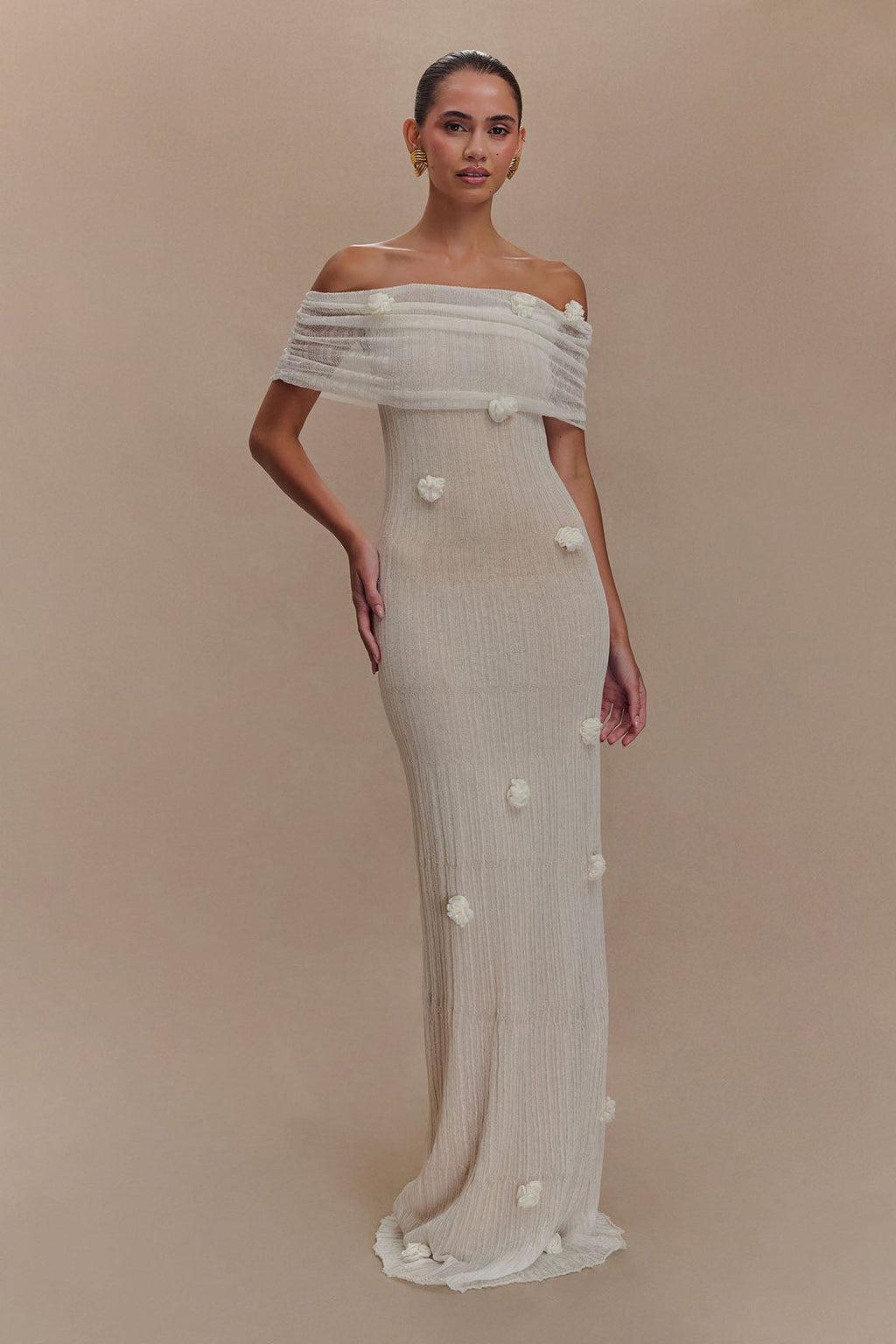 Women's off-shoulder knit maxi dress with decorative rosettes