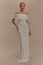 Women's off-shoulder knit maxi dress with decorative rosettes