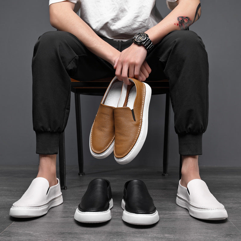 Textured slip-on loafers with rounded toes and flat soles