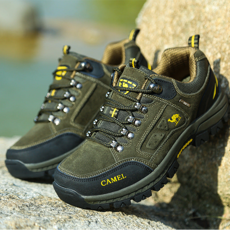 Lace-up hiking shoe with layered panels and chunky tread sole