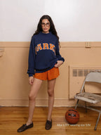 Women's oversized sweatshirt with mock neck, long sleeves and varsity lettering