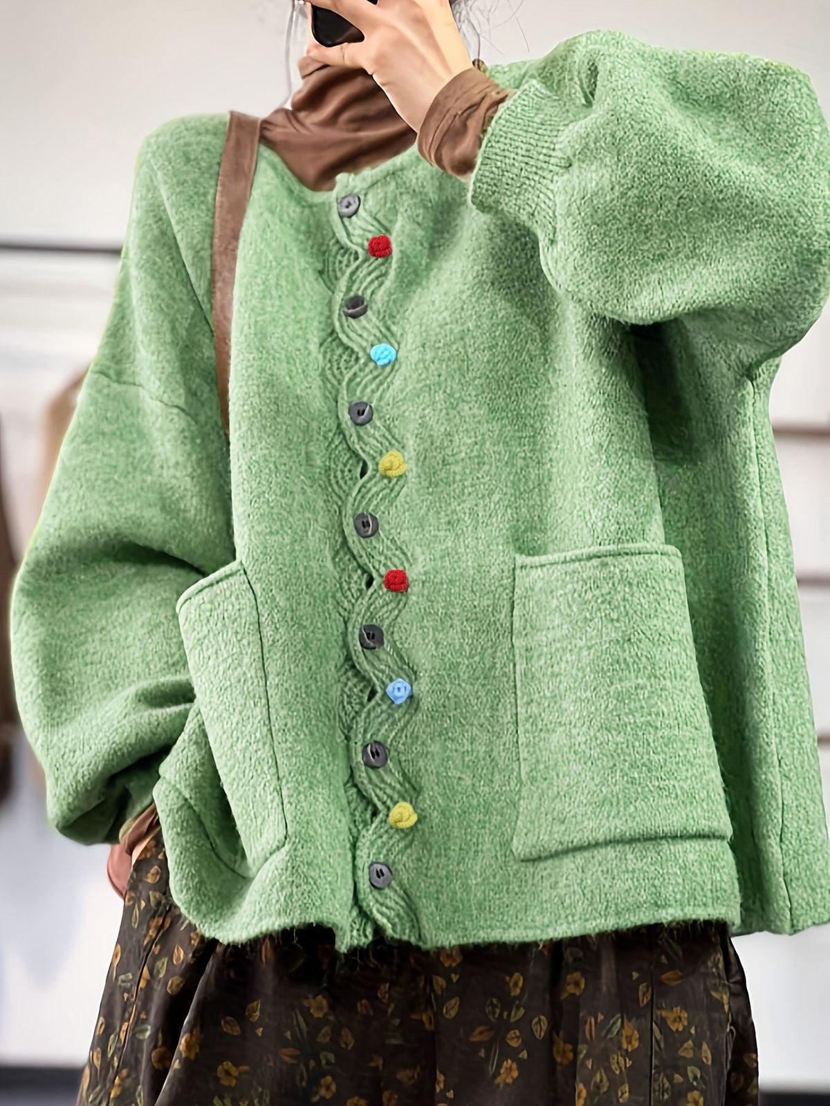 Women's green boxy cardigan with V-neck, colourful buttons and front patch pockets