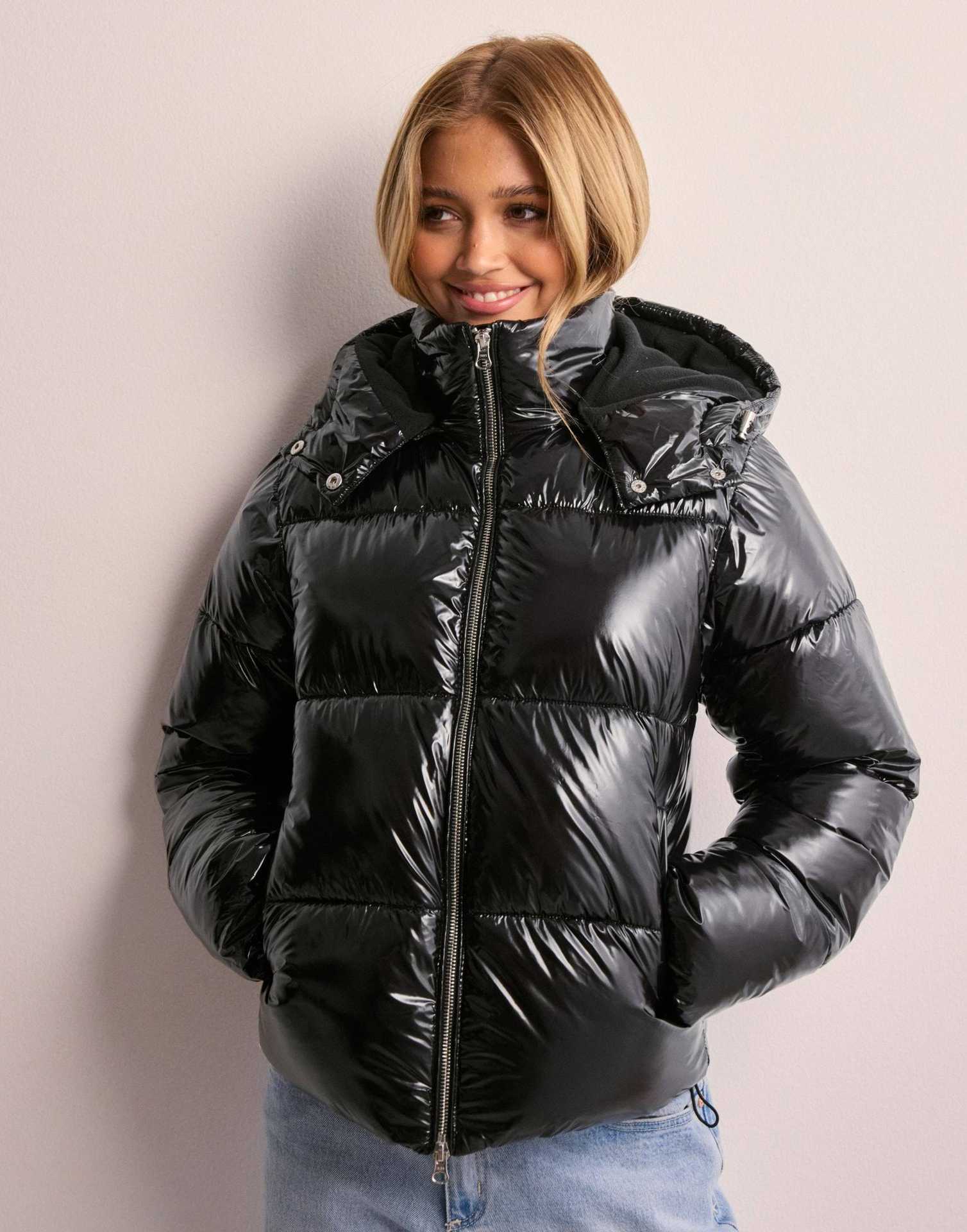 Women's shiny quilted hooded puffer jacket with leopard cuffs