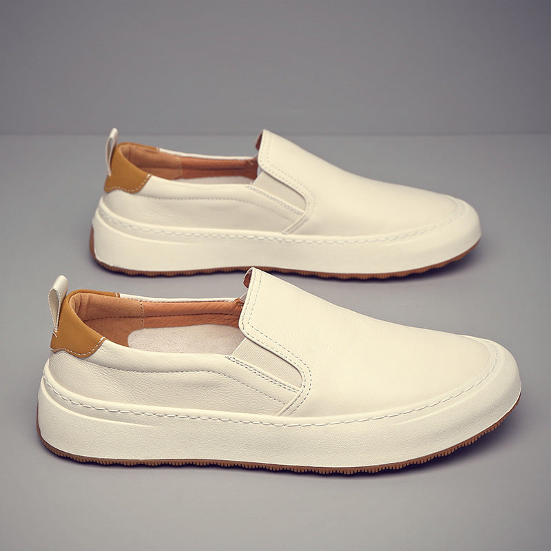 Slip-on loafers with rounded toes, contrast soles and heel pull tabs