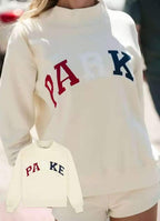 Women's oversized sweatshirt with mock neck, long sleeves and varsity lettering