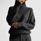 Women's geometric textured mock neck sweater with long sleeves