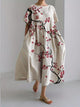 Women's loose floral midi dress with short sleeves and flared skirt