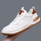 Low-top panelled lace-up trainers with contrasting sole and pull tabs