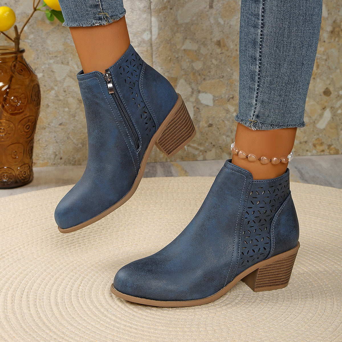 Women's ankle boots with laser cut panels and block heel
