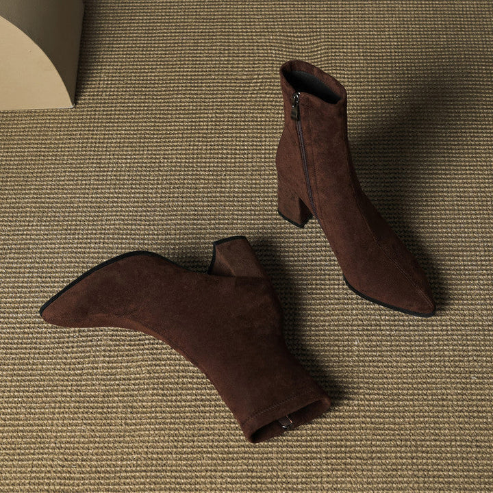 Women's ankle boots with pointed toes, side zips and high block heels