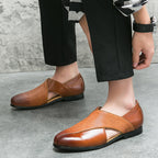 Textured loafers with penny-style straps in brown and black