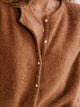 Women's knit V-neck cardigan with button front and long sleeves