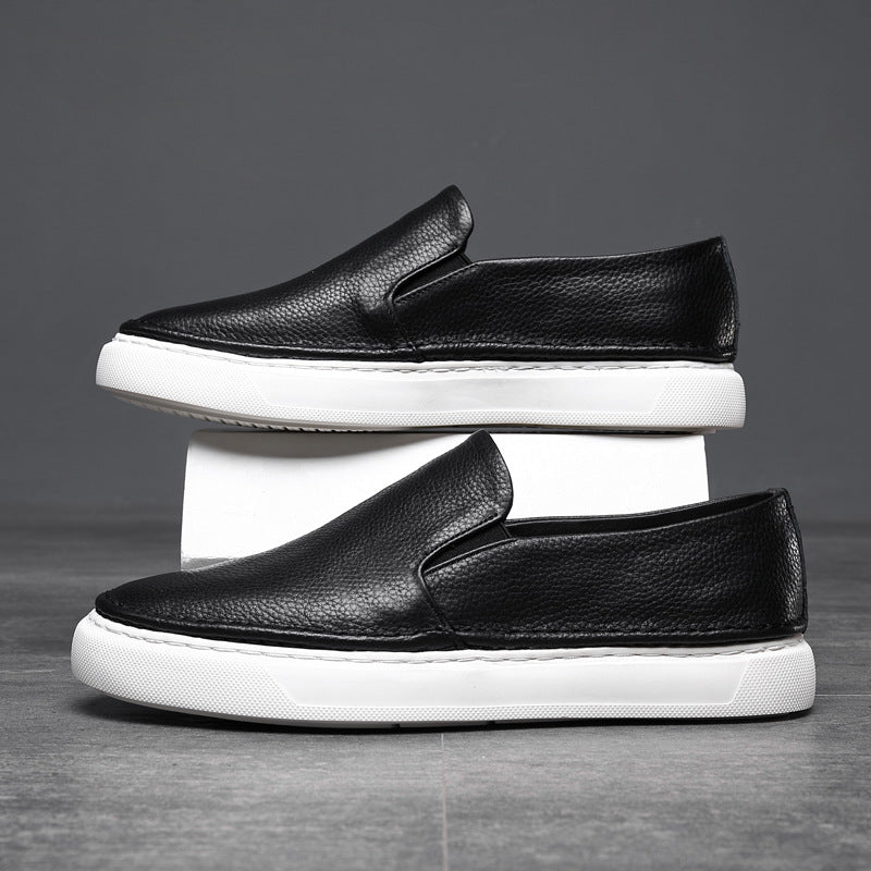 Textured slip-on loafers with rounded toes and flat soles