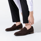 Men's penny loafer with almond toe, vamp strap and low heel