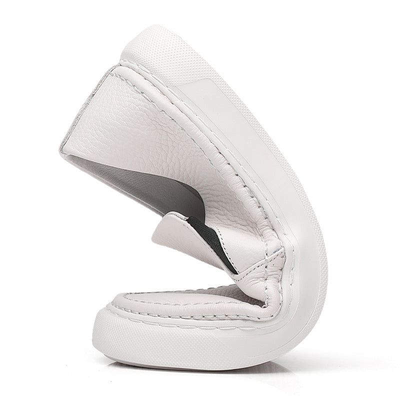 Textured slip-on loafers with rounded toes and flat soles