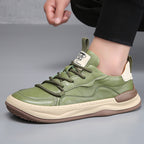Low-top panelled lace-up trainers with contrasting sole and pull tabs