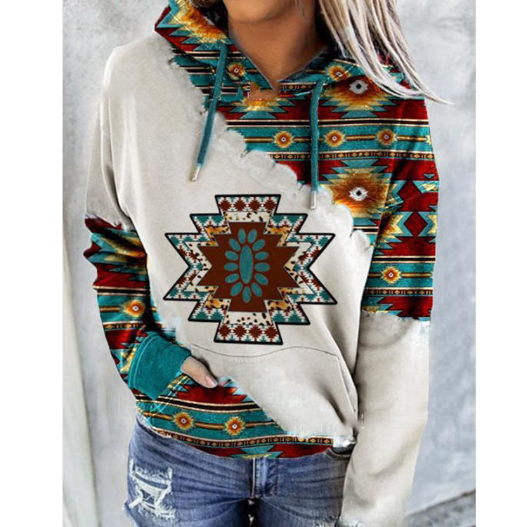 Women's hooded sweatshirt with Aztec geometric patterned panels and kangaroo pocket