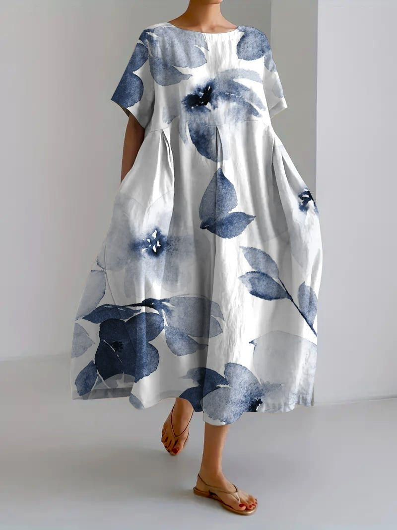 Women's loose floral midi dress with short sleeves and flared skirt