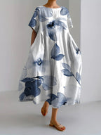 Women's loose floral midi dress with short sleeves and flared skirt