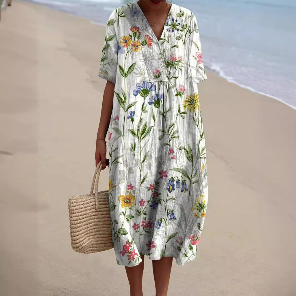 Women's floral V-neck shift dress with short sleeves and knee-length hem