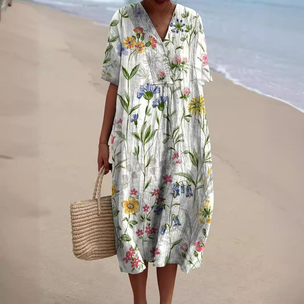 Women's floral V-neck shift dress with short sleeves and knee-length hem