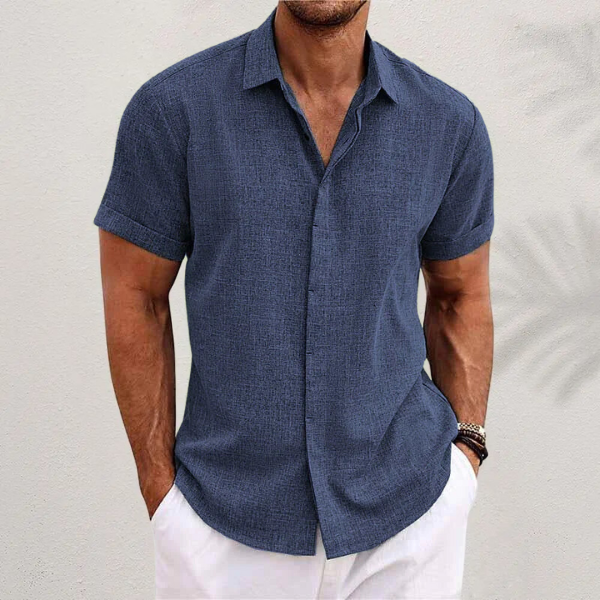 Men's short sleeve collared button shirt with textured finish