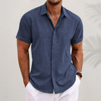 Men's short sleeve collared button shirt with textured finish