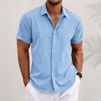 Men's short sleeve collared button shirt with textured finish