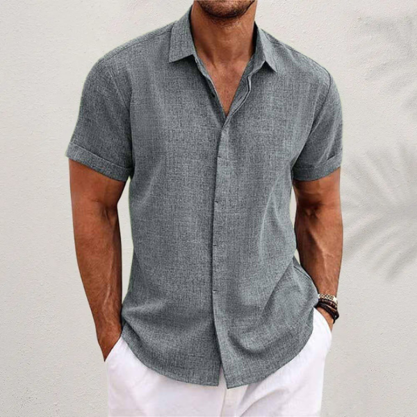 Men's short sleeve collared button shirt with textured finish
