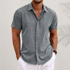 Men's short sleeve collared button shirt with textured finish