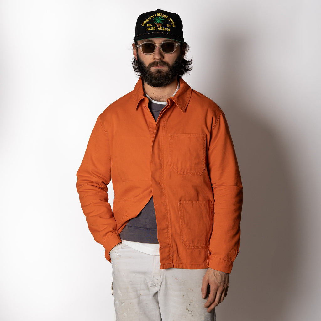 Men's orange utility jacket with collar and patch pockets