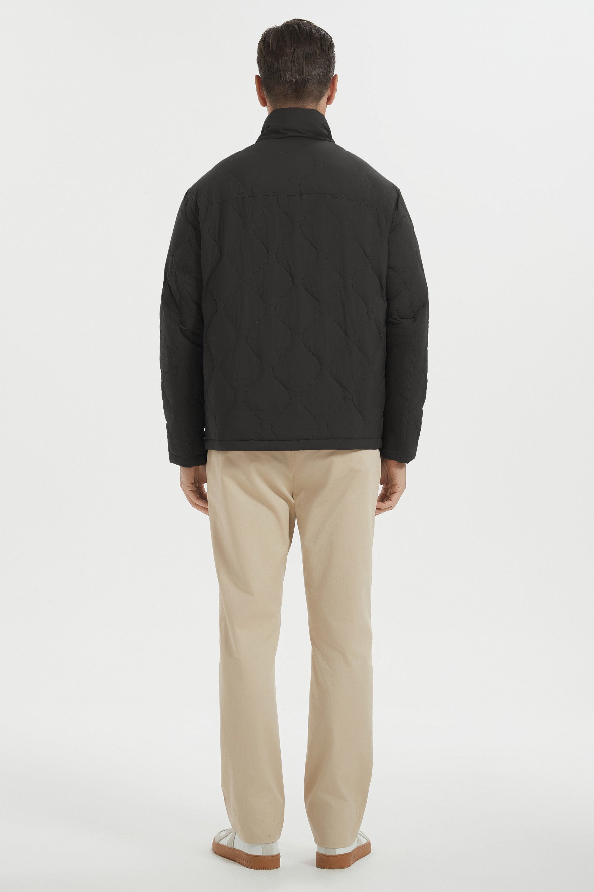 Men's black quilted bomber jacket with stand collar
