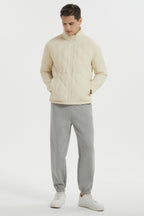 Men's black quilted bomber jacket with stand collar