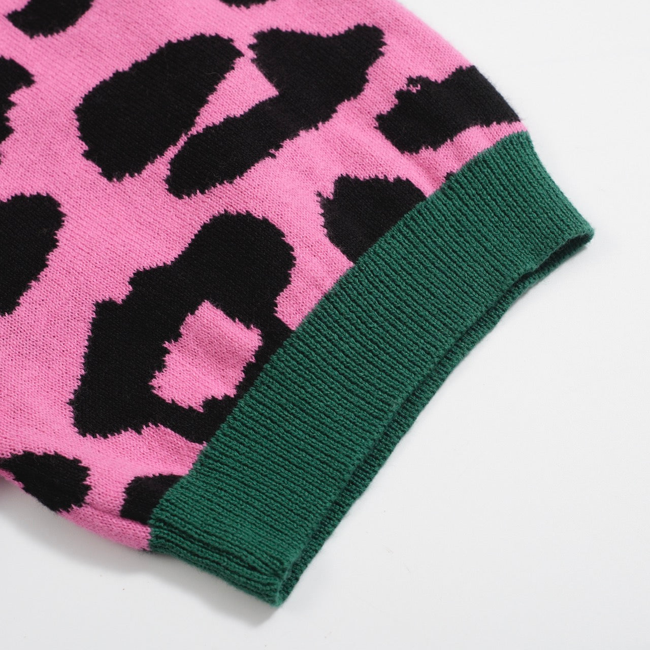 Men's pink leopard print polo shirt with cheetah and leaf graphic