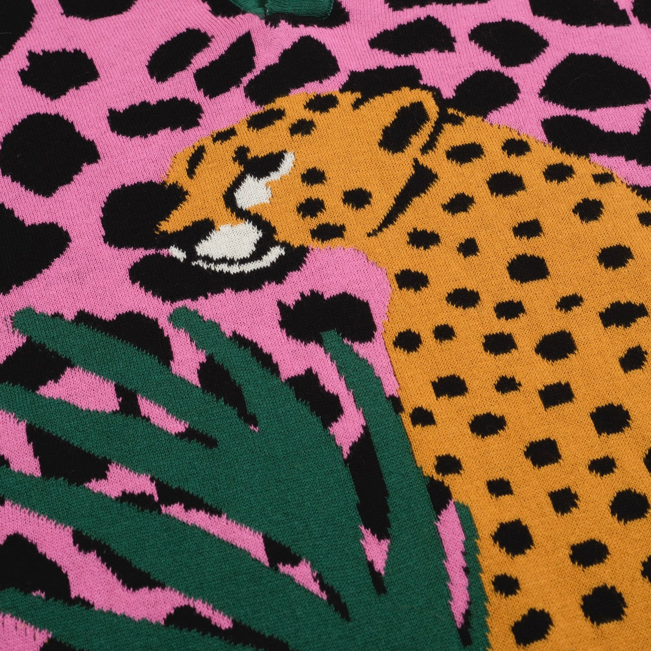 Men's pink leopard print polo shirt with cheetah and leaf graphic
