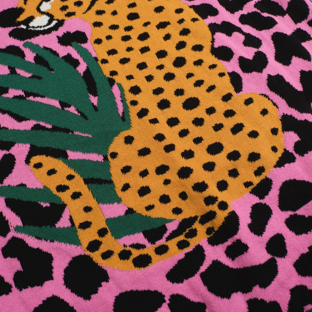 Men's pink leopard print polo shirt with cheetah and leaf graphic