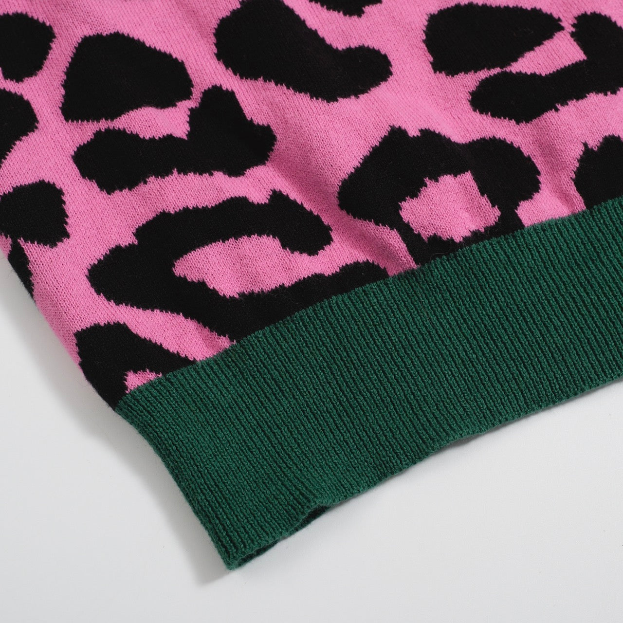 Men's pink leopard print polo shirt with cheetah and leaf graphic