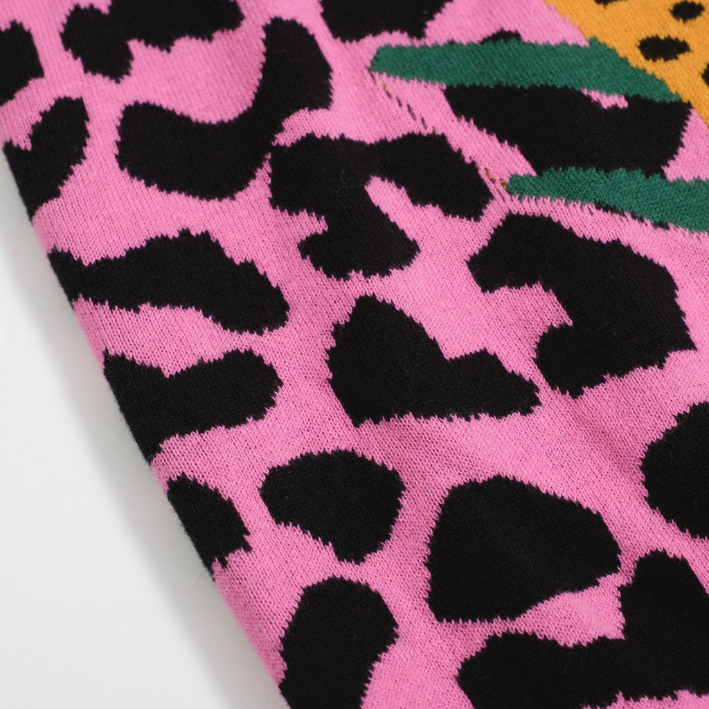 Men's pink leopard print polo shirt with cheetah and leaf graphic
