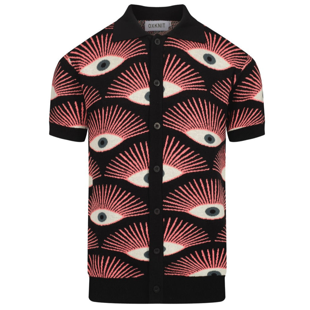 Men's black knitted polo shirt with repeated pink, cream and grey eye pattern