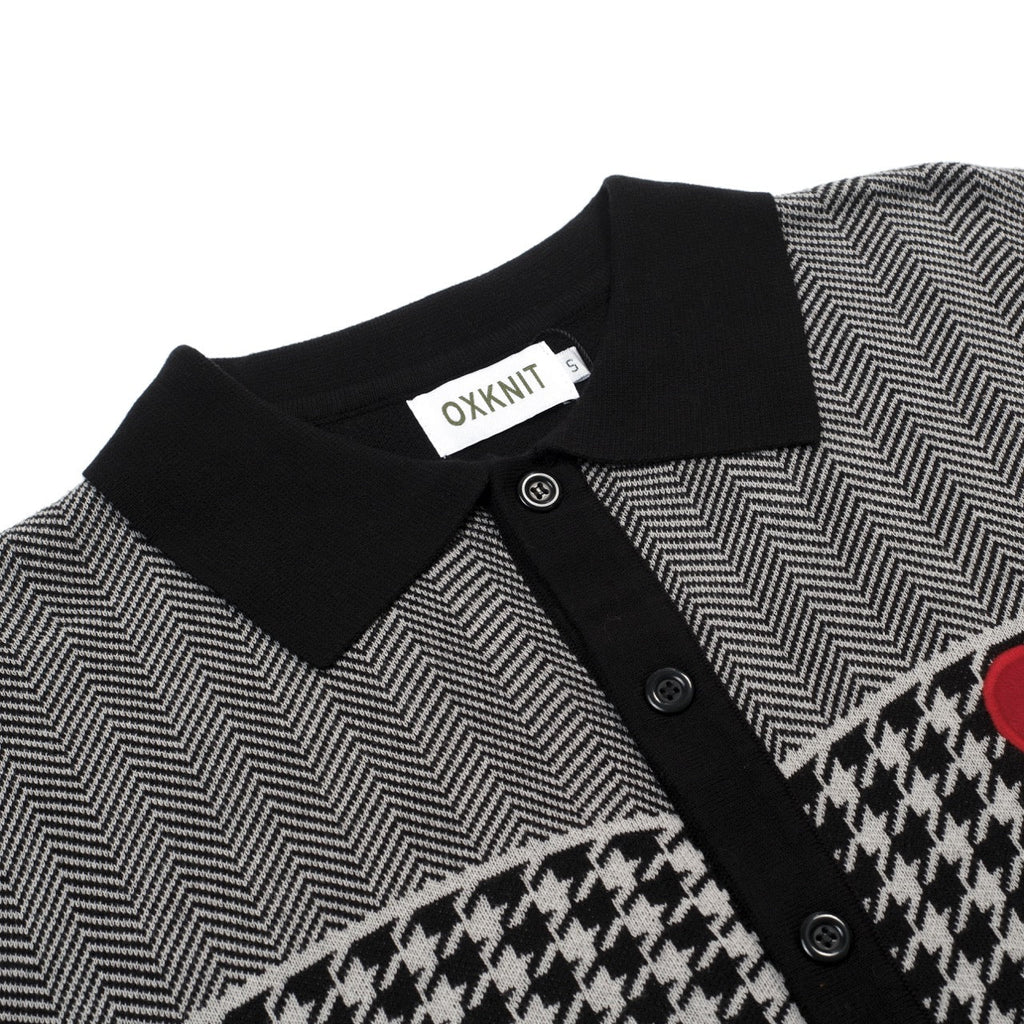 Men's black knitted polo cardigan with houndstooth pattern and red heart patch